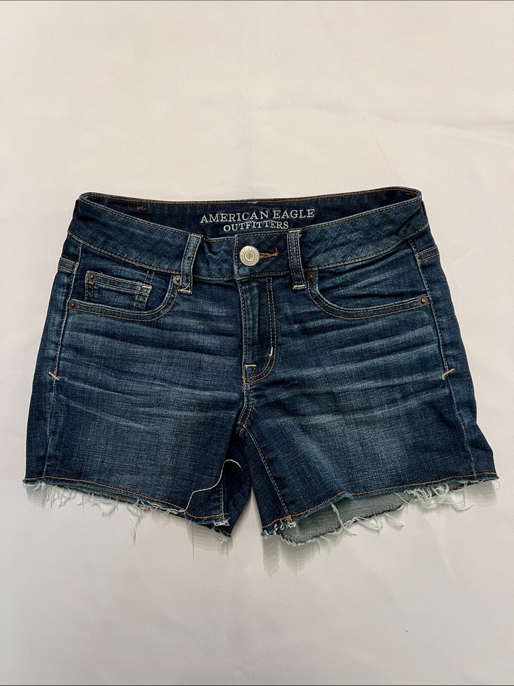 American Eagle Navy Blue Distressed Denim Cutoff “Shortie” Size 2 “SuperStretch”